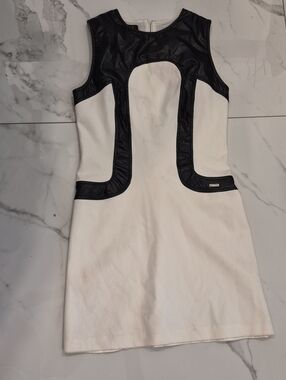 Sleeveless White Mini Dress with Black Faux-Leather Trim
